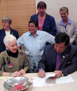 Governor Richardson signs an executive order extending benefits to domestic partners of state employees