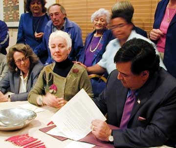 Governor Richardson signs the non-discrimination act